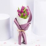 7 Purple Tulips Beautifully Wrapped and Tied